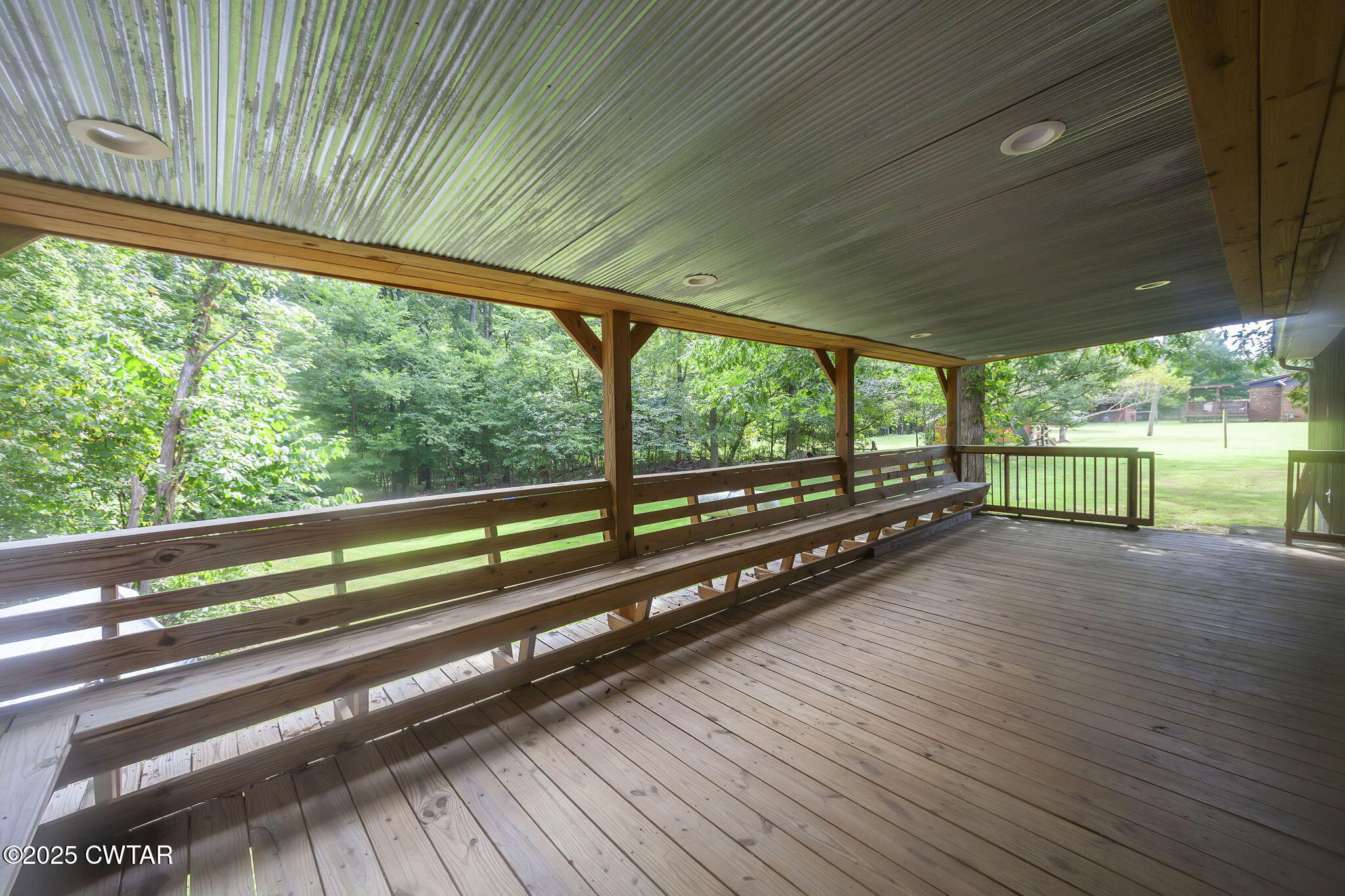 499 Diamond Grove Road Beech Bluff, TN 38313 - Photo 25 of 28 a view of two room with wooden floor and windows