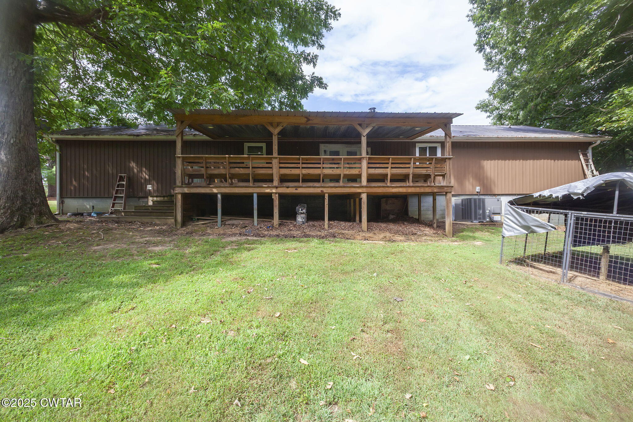 499 Diamond Grove Road Beech Bluff, TN 38313 - Photo 27 of 28 a view of a house with a yard and sitting area