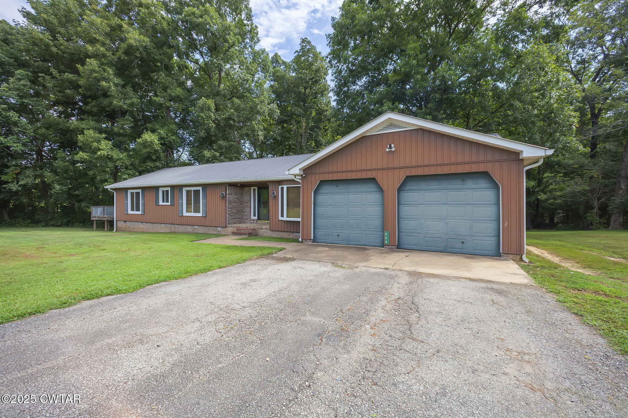 499 Diamond Grove Road Beech Bluff, TN 38313 - Photo 3 of 28 a front view of a house with yard