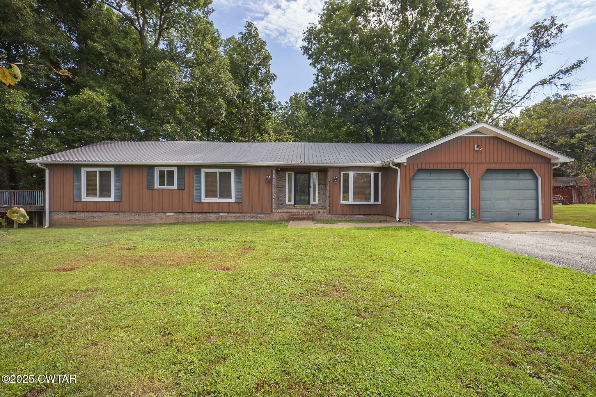 499 Diamond Grove Road Beech Bluff, TN 38313 - Photo 4 of 28 a front view of a house with yard