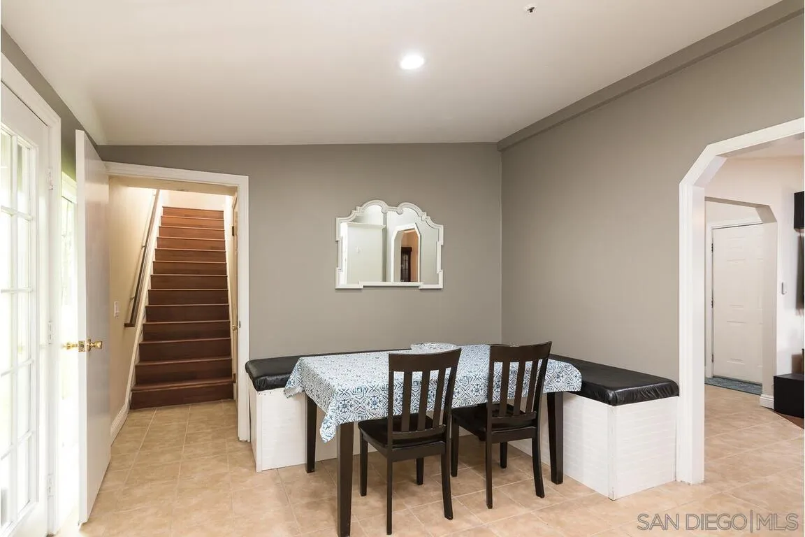 9399 Weber Court Spring Valley, CA 91977 - Photo 14 of 41 a view of a livingroom with furniture and staircase