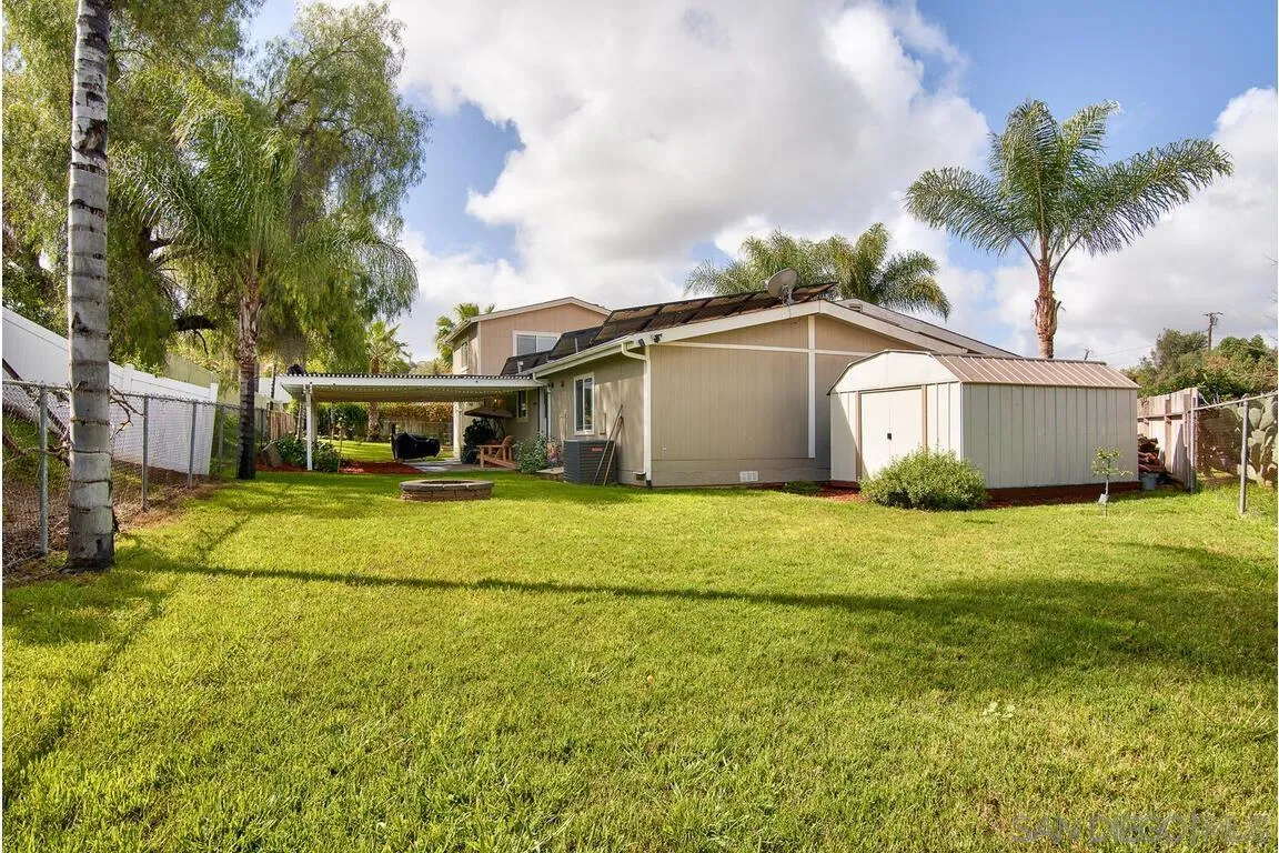 9399 Weber Court Spring Valley, CA 91977 - Photo 31 of 41 a front view of house with yard and trees