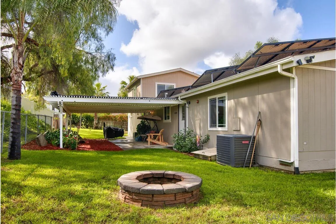 9399 Weber Court Spring Valley, CA 91977 - Photo 32 of 41 a view of a house with a backyard porch and sitting area