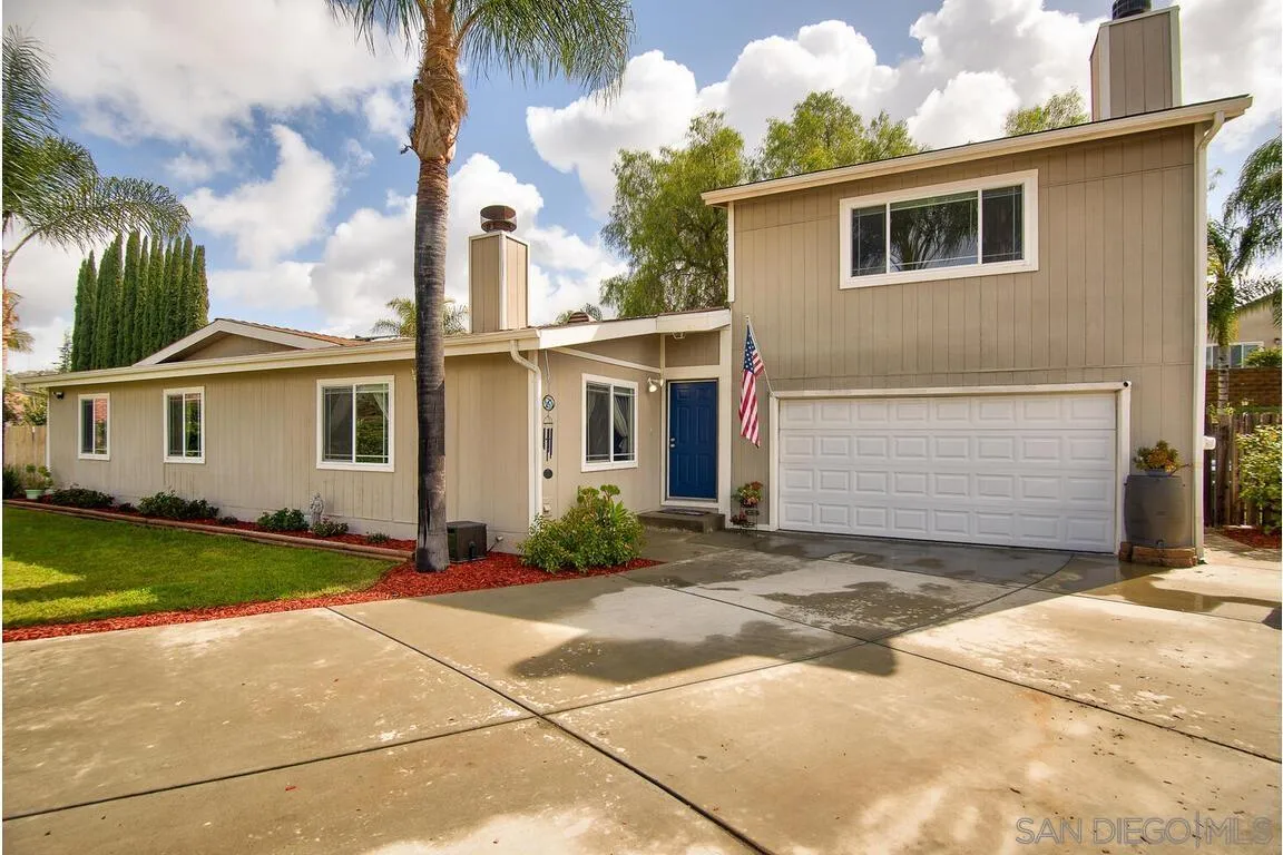 9399 Weber Court Spring Valley, CA 91977 - Photo 37 of 41 a front view of a house with a garden