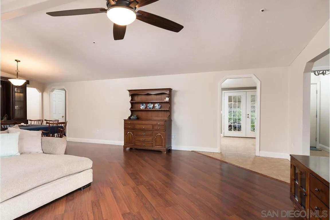 9399 Weber Court Spring Valley, CA 91977 - Photo 6 of 41 a living room with furniture and wooden floor