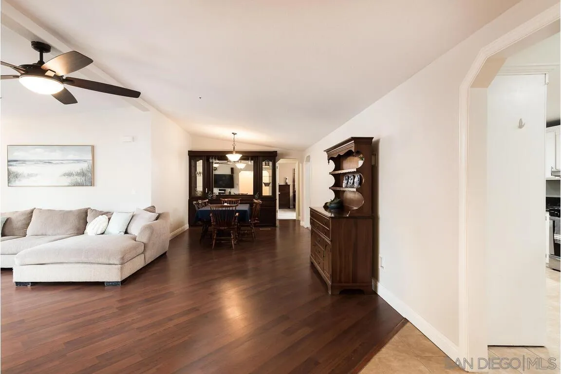 9399 Weber Court Spring Valley, CA 91977 - Photo 7 of 41 a living room with furniture and a wooden floor