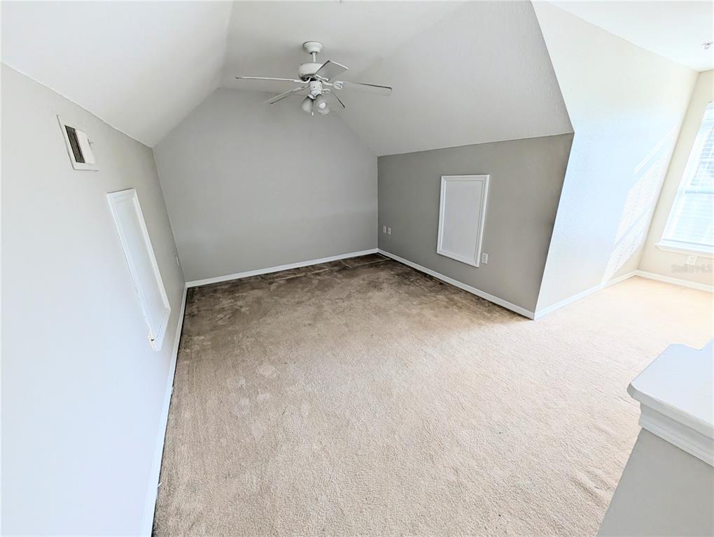 5531 Rosehill Road, Unit 203 Sarasota, FL 34233 - Photo 18 of 18 a view of an empty room with a window