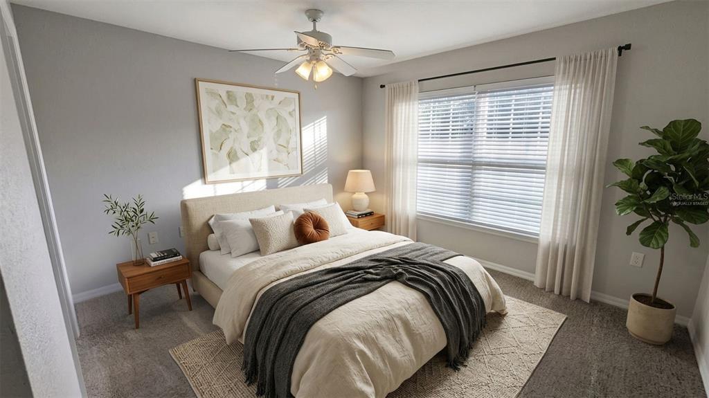 5531 Rosehill Road, Unit 203 Sarasota, FL 34233 - Photo 8 of 18 a bedroom with a bed and a window