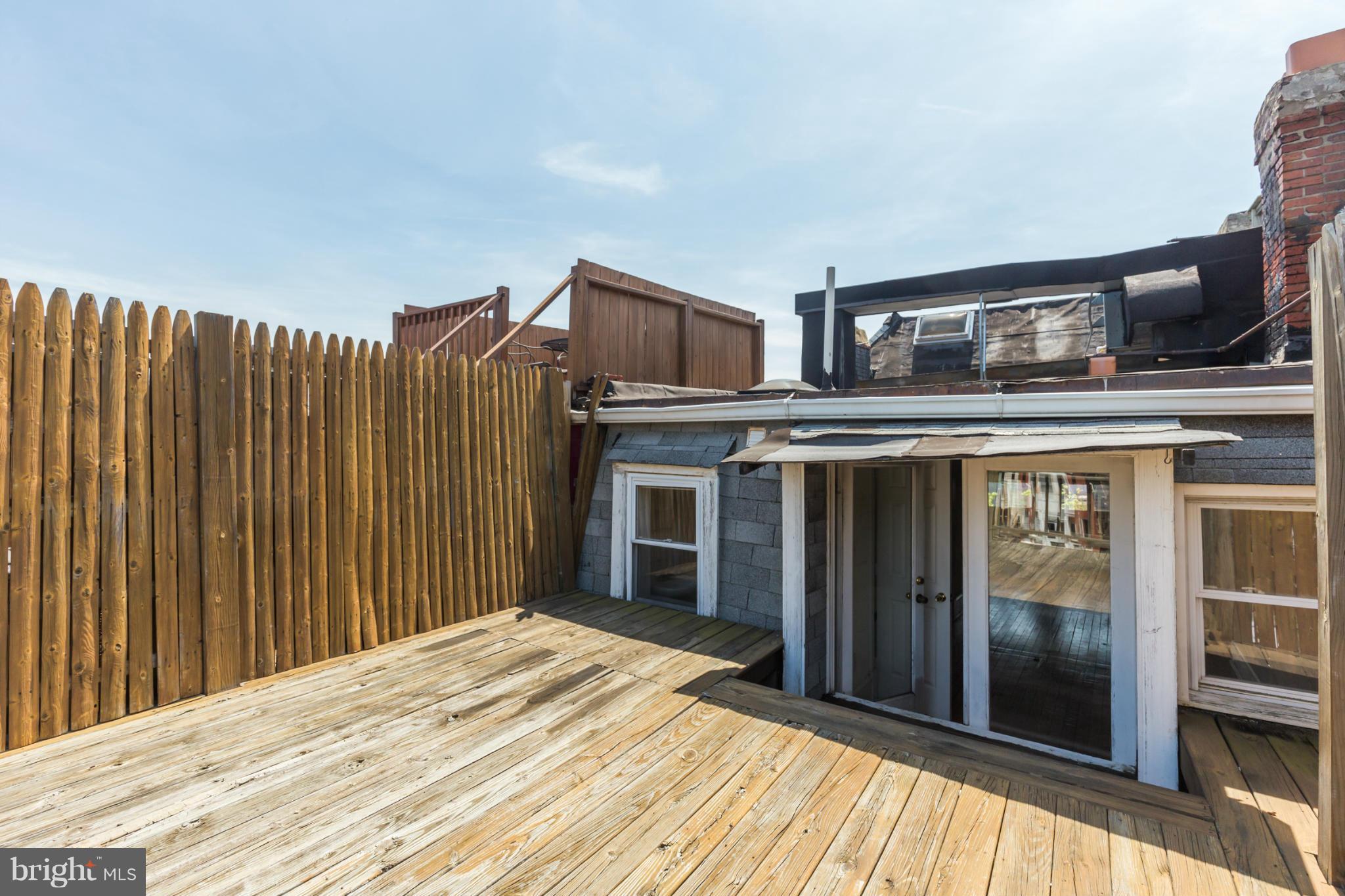 1823 Kalorama Road Northwest Washington, DC 20009 - Photo 16 of 20 a view of a house with a balcony