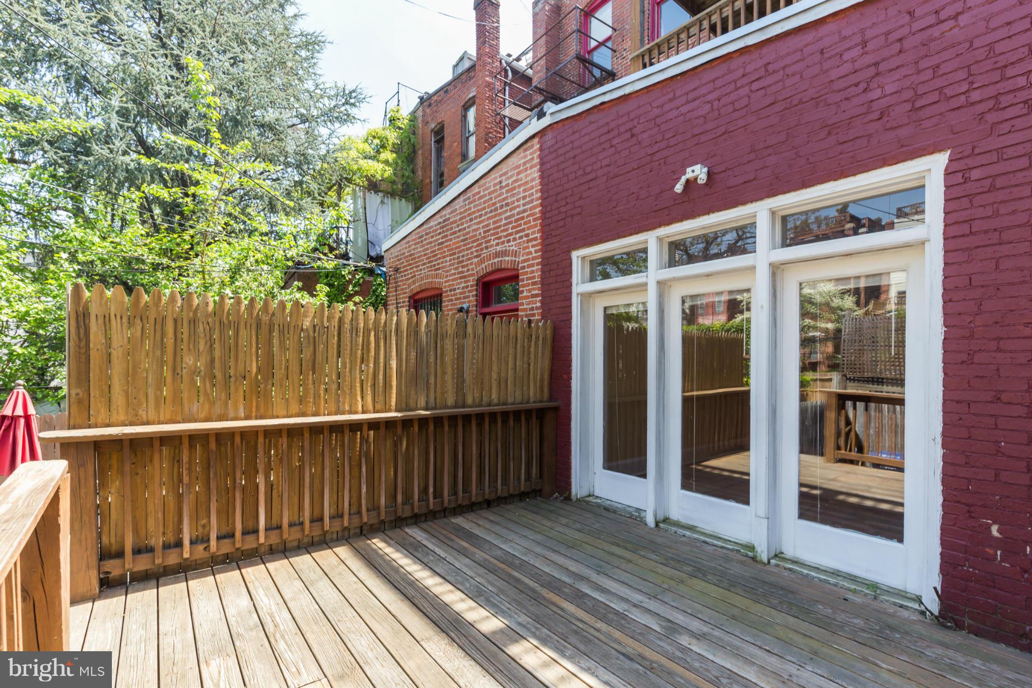1823 Kalorama Road Northwest Washington, DC 20009 - Photo 18 of 20 a view of a wooden deck