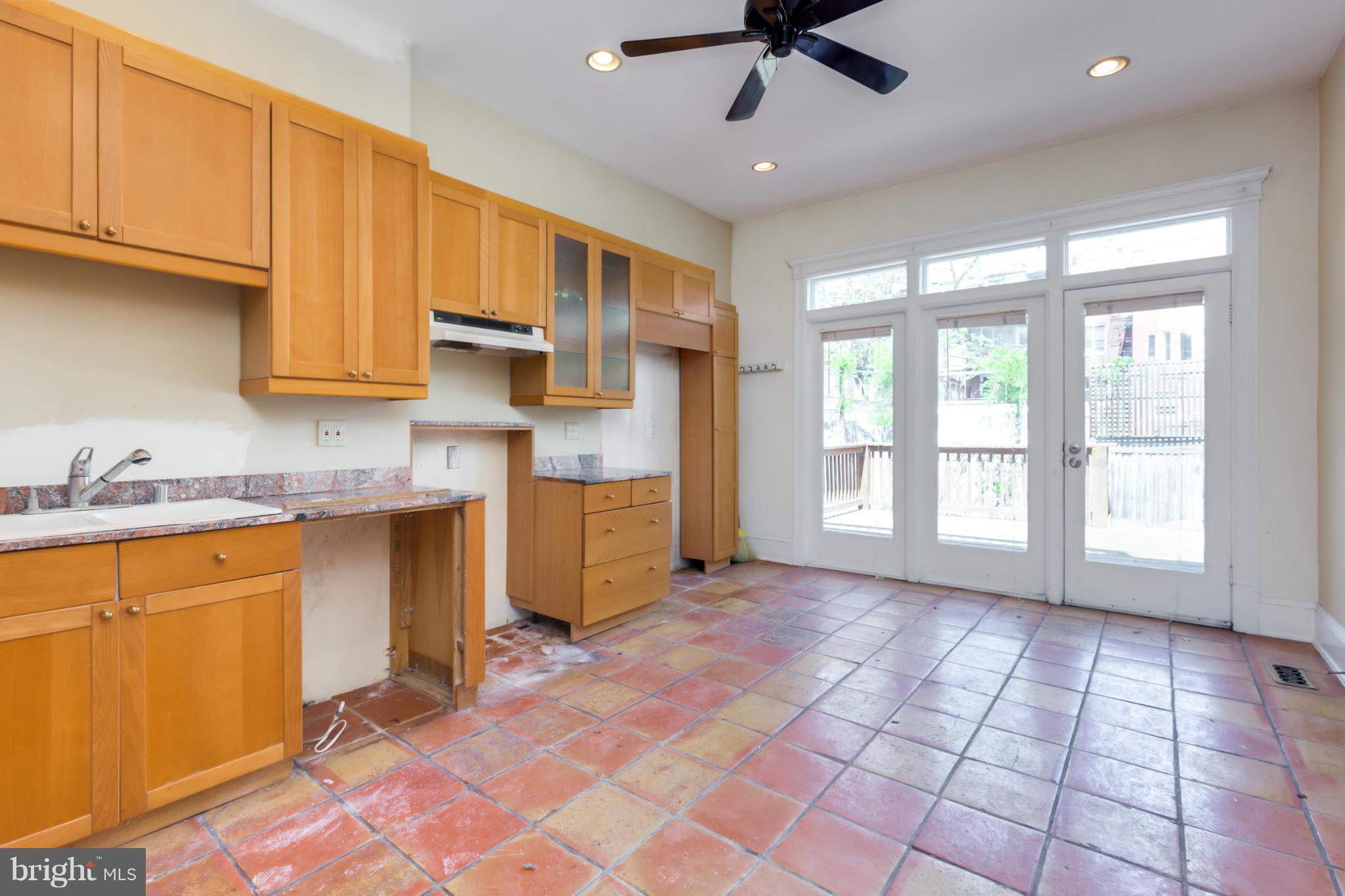 1823 Kalorama Road Northwest Washington, DC 20009 - Photo 6 of 20 a view of a kitchen with electric appliances