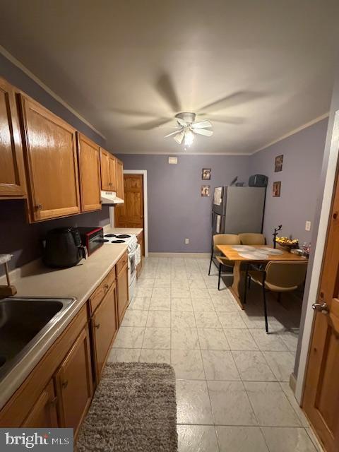1422 Fanshawe Street Philadelphia, PA 19111 - Photo 2 of 12 a kitchen with a sink appliances and cabinets