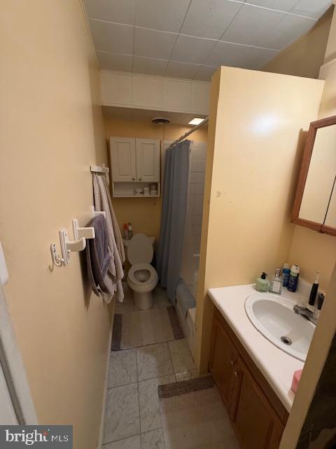 1422 Fanshawe Street Philadelphia, PA 19111 - Photo 6 of 12 a bathroom with a sink a toilet and mirror