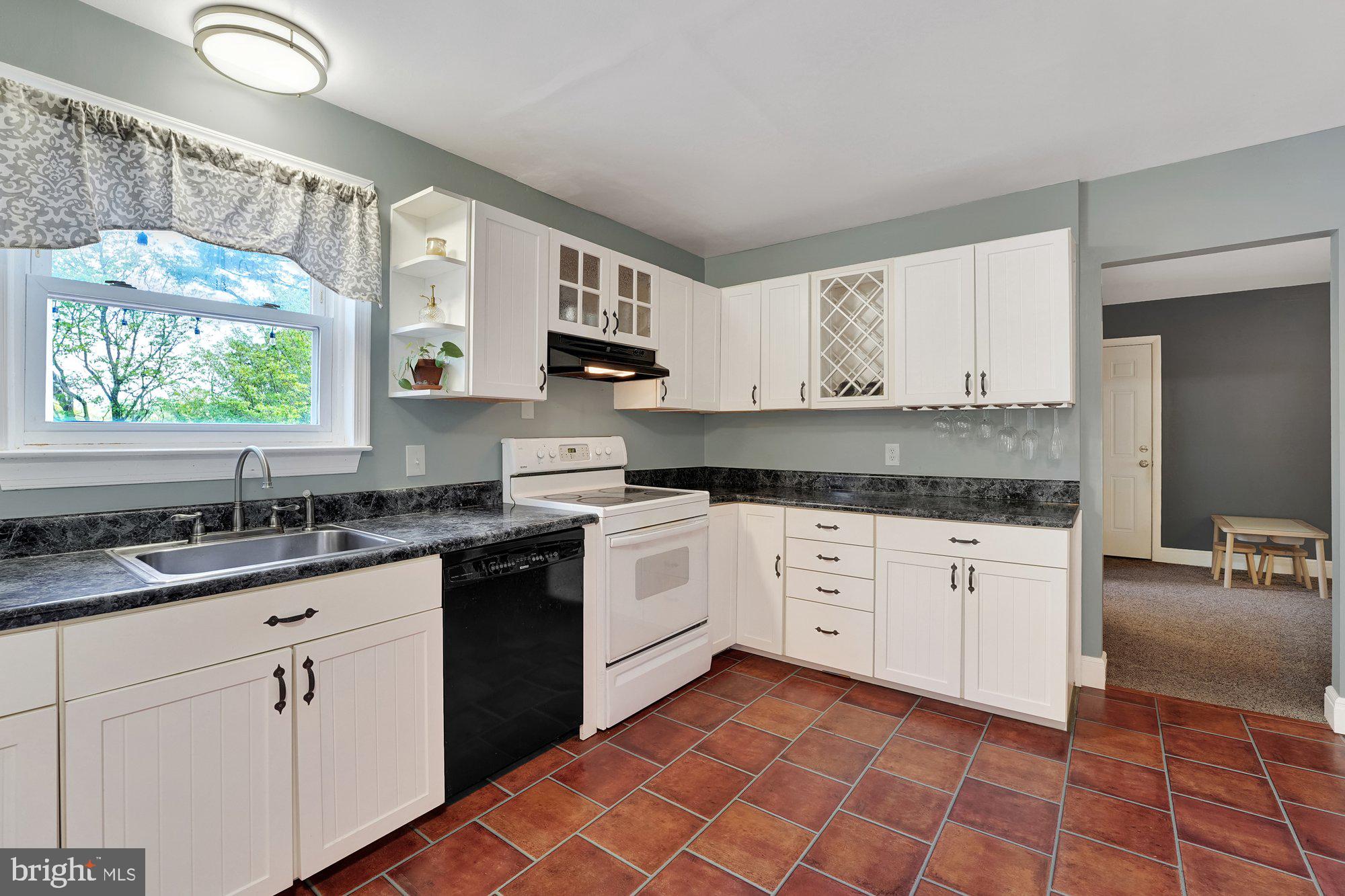 13 Higgins Road Newark, DE 19711 - Photo 12 of 37 Updated Kitchen Overlooking Rear Yard