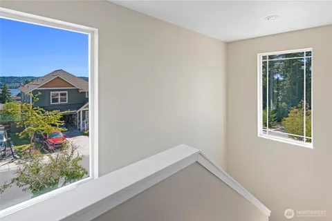 a view of a house with a flower garden