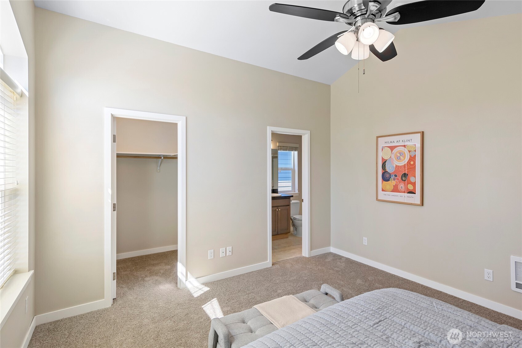 26442 GRAVITY Avenue Northeast Kingston, WA 98346 - Photo 20 of 40 an empty room with closet and a chandelier fan
