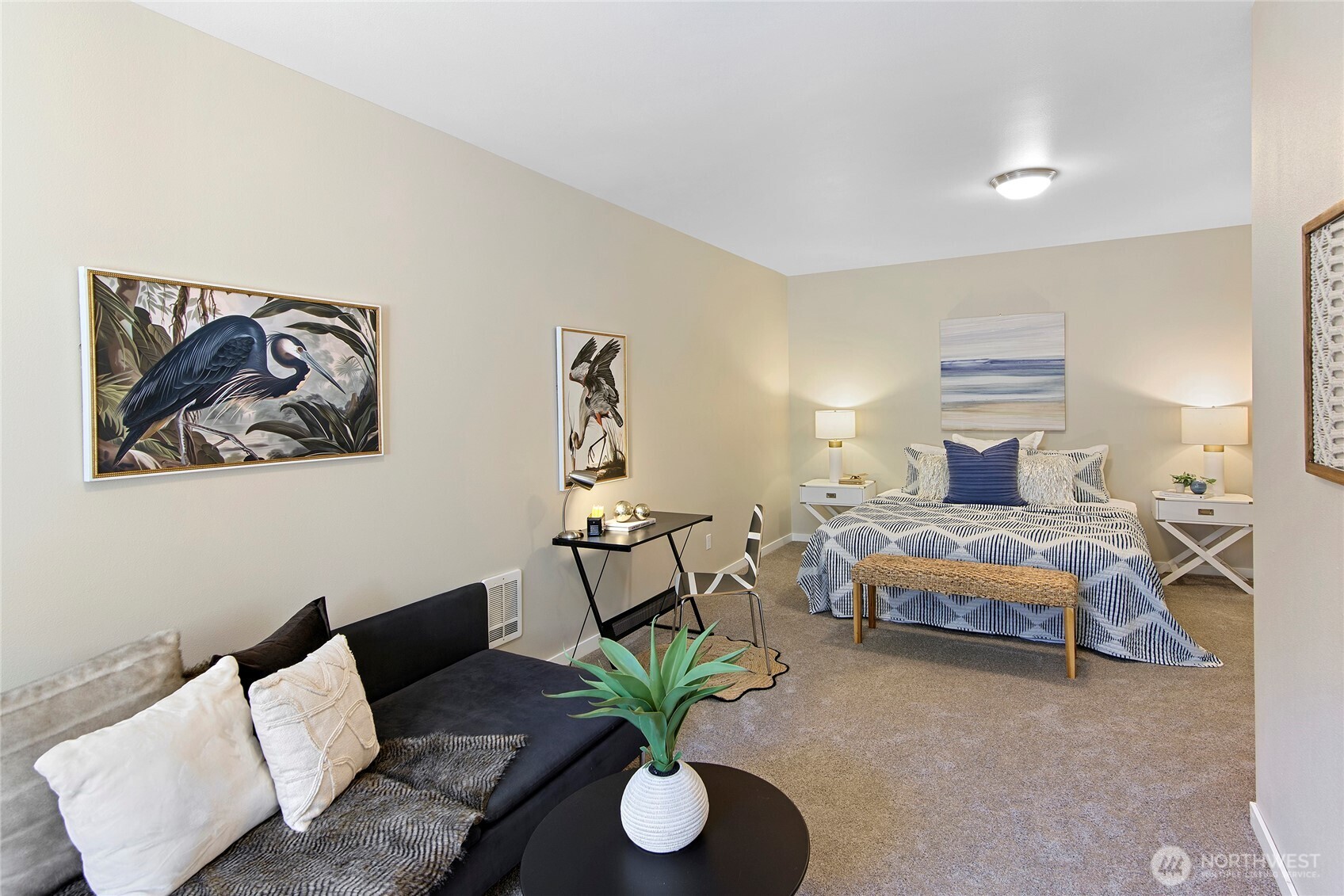 26442 GRAVITY Avenue Northeast Kingston, WA 98346 - Photo 27 of 40 a bedroom with furniture and a potted plant