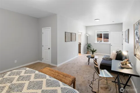 a workspace with furniture and window