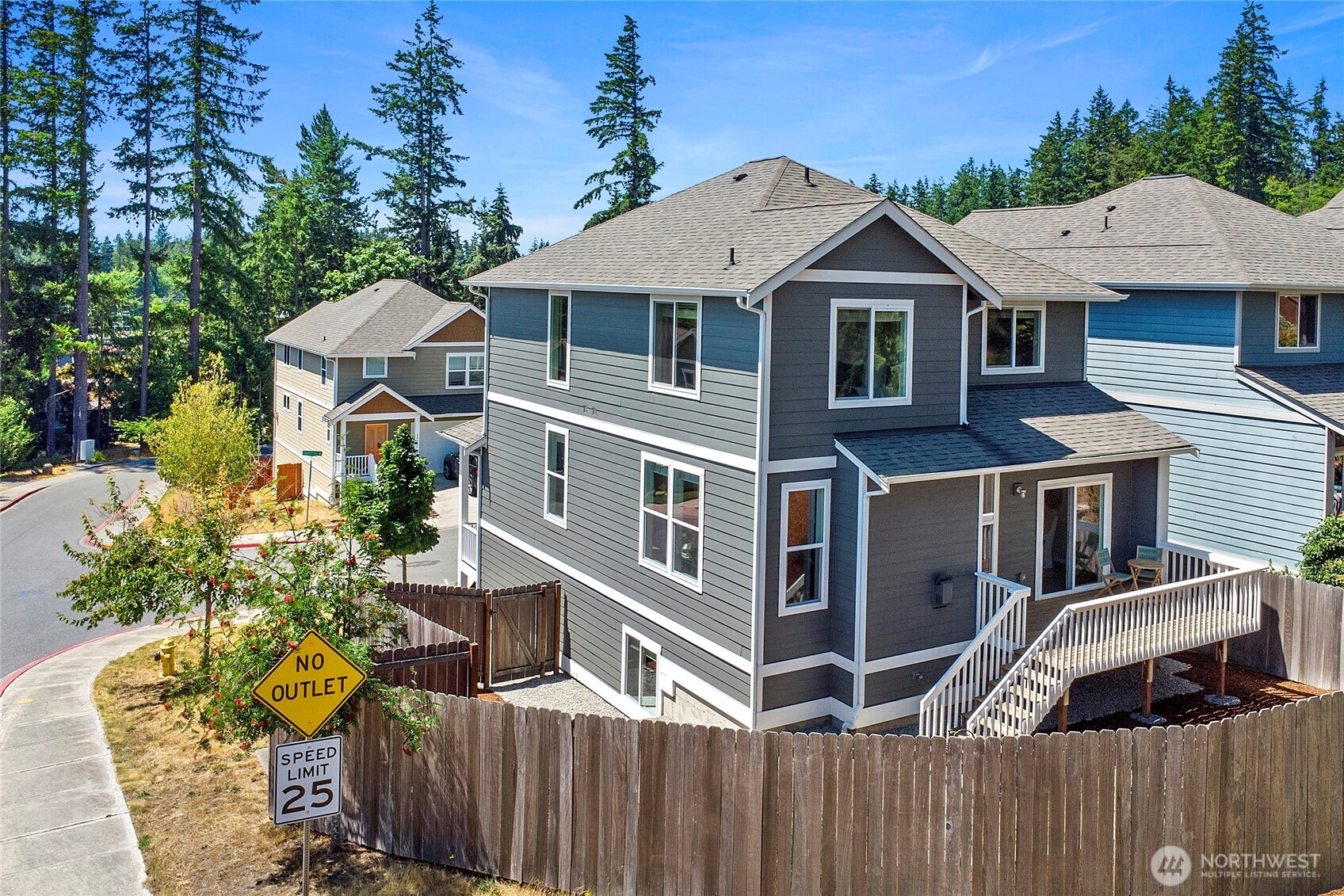 26442 GRAVITY Avenue Northeast Kingston, WA 98346 - Photo 32 of 40 a aerial view of a house with a yard