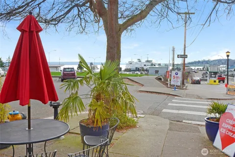a view of a table and chairs in the patio