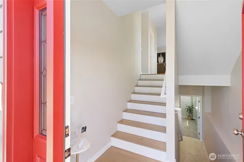 a view of entryway with a front door