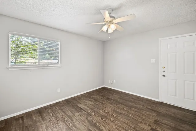 a view of a kitchen with a sink and dishwasher