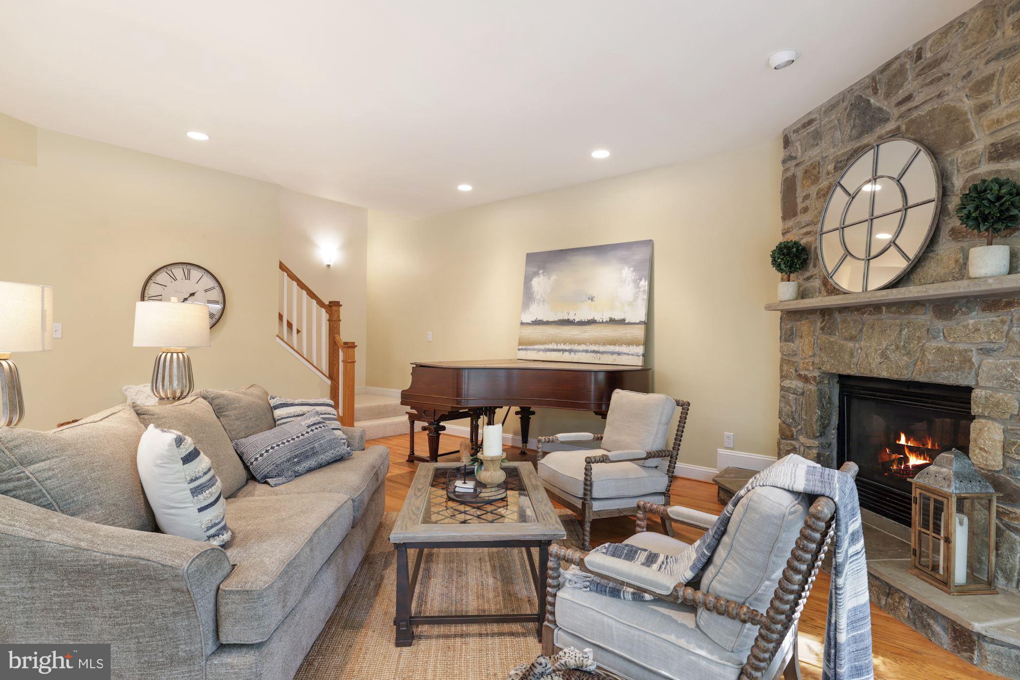 9448 Seven Locks Road Bethesda, MD 20817 - Photo 19 of 46 Family Room w stone FP, back staircase