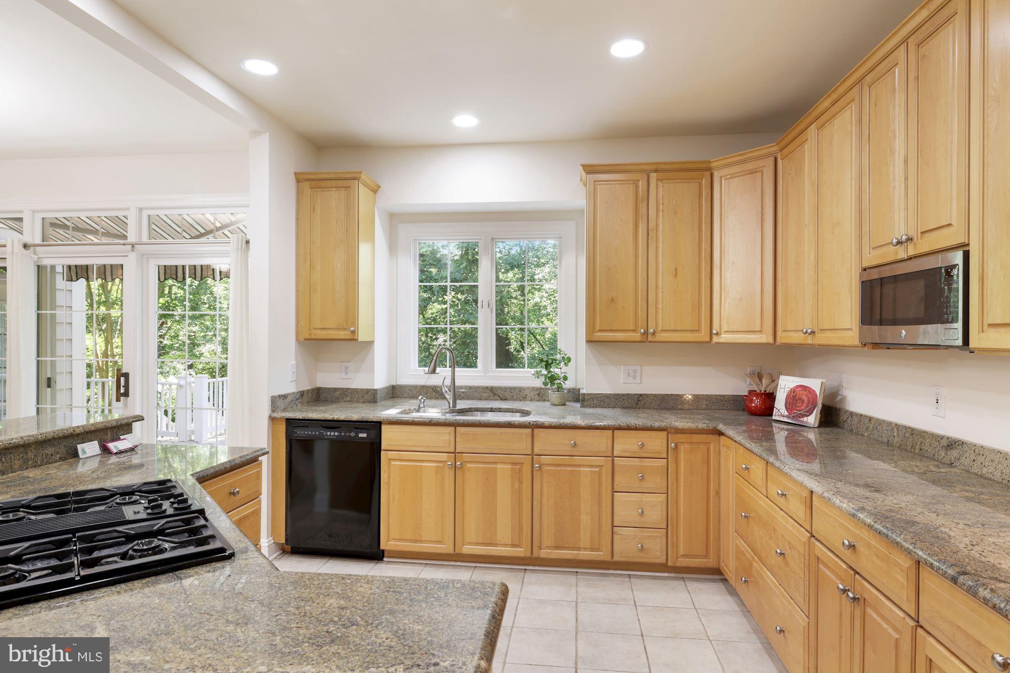 9448 Seven Locks Road Bethesda, MD 20817 - Photo 22 of 46 Center isle, ample cabinetry and countertops