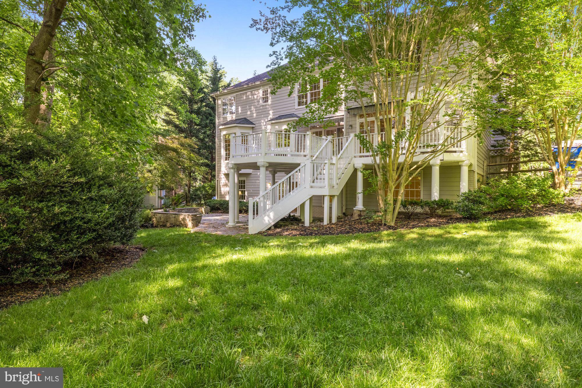 9448 Seven Locks Road Bethesda, MD 20817 - Photo 4 of 46 Private back yard, sprawling lawn backs to trees
