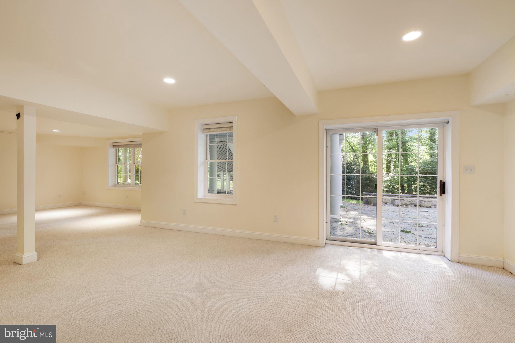 9448 Seven Locks Road Bethesda, MD 20817 - Photo 36 of 46 Fully finished walkout Lower Level, doors to patio