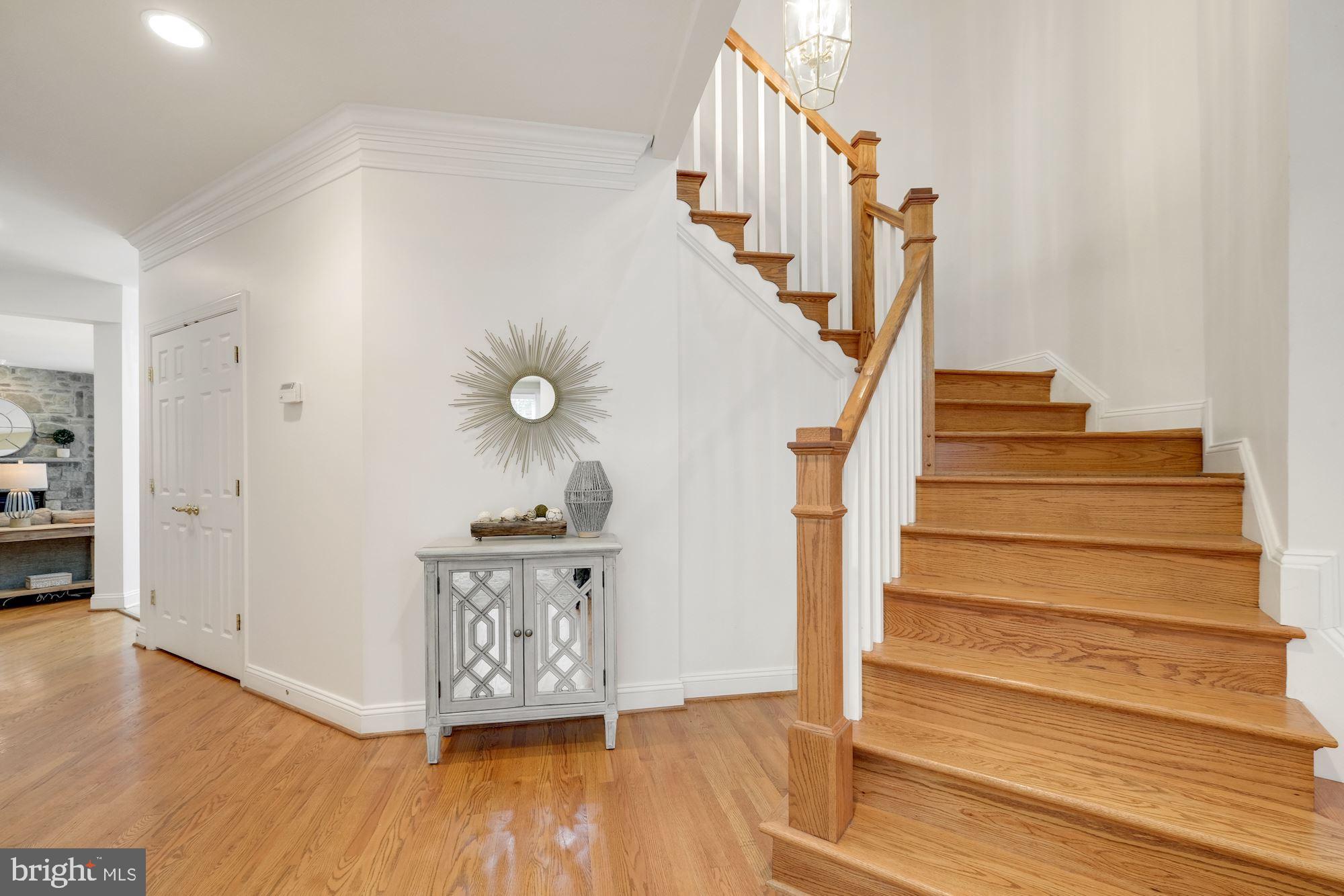 9448 Seven Locks Road Bethesda, MD 20817 - Photo 5 of 46 Large entry foyer, curving front staircase