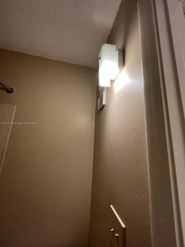 a bathroom with a double vanity sink and mirror