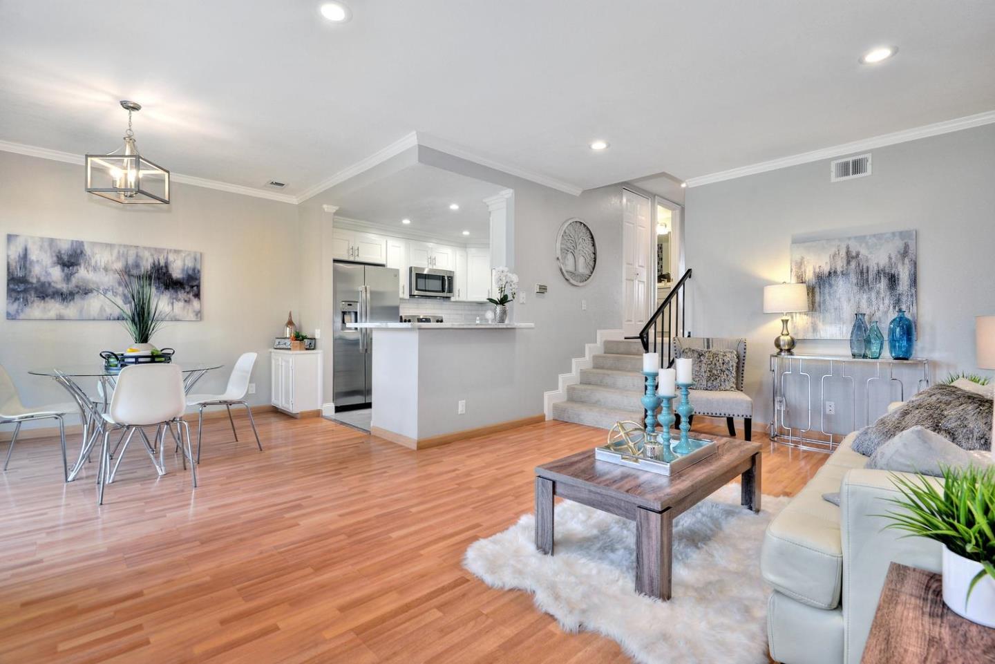 301 Kenbrook Circle San Jose, CA 95111 - Photo 1 of 19 a living room with furniture and wooden floor