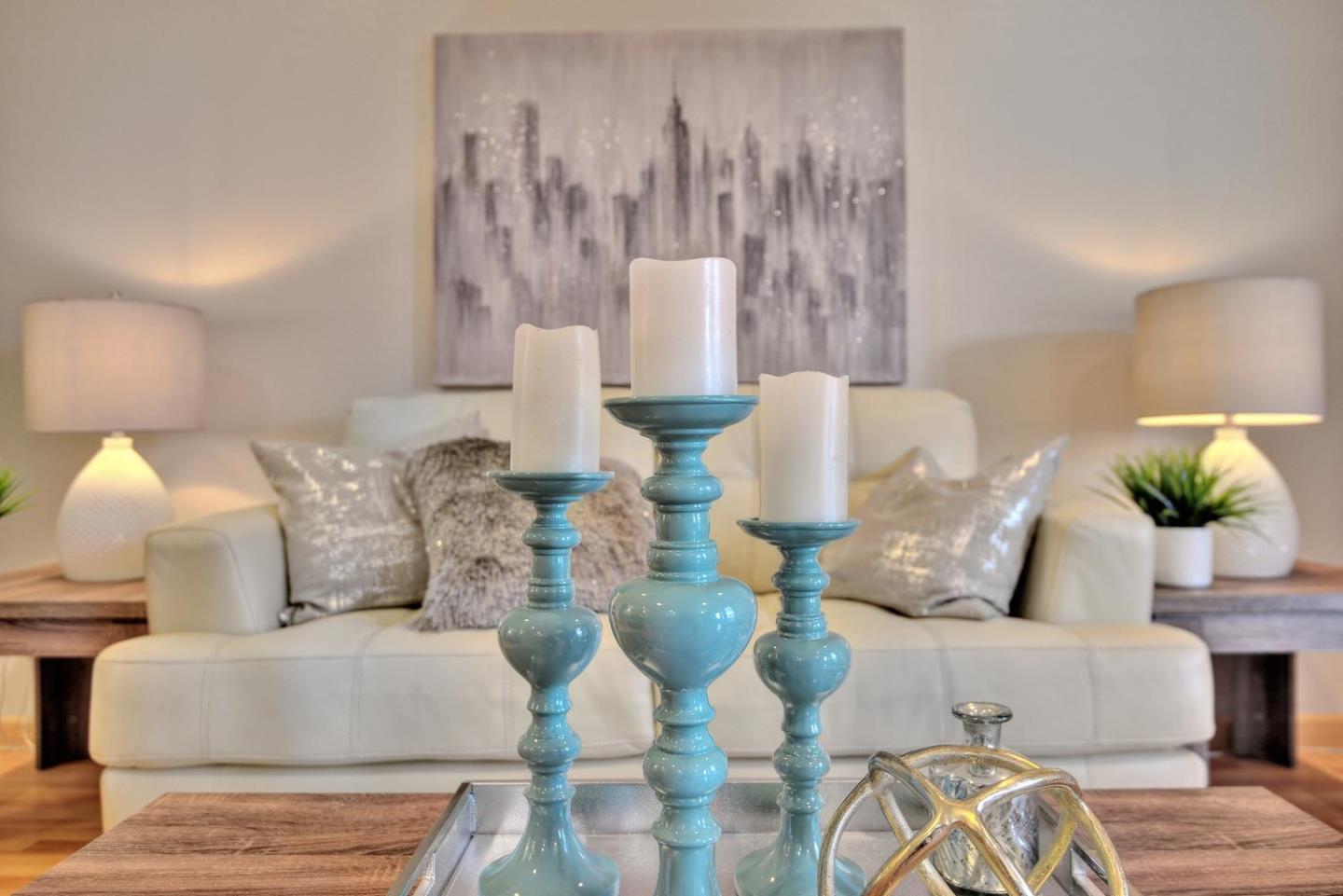 301 Kenbrook Circle San Jose, CA 95111 - Photo 2 of 19 a living room with furniture and a painting