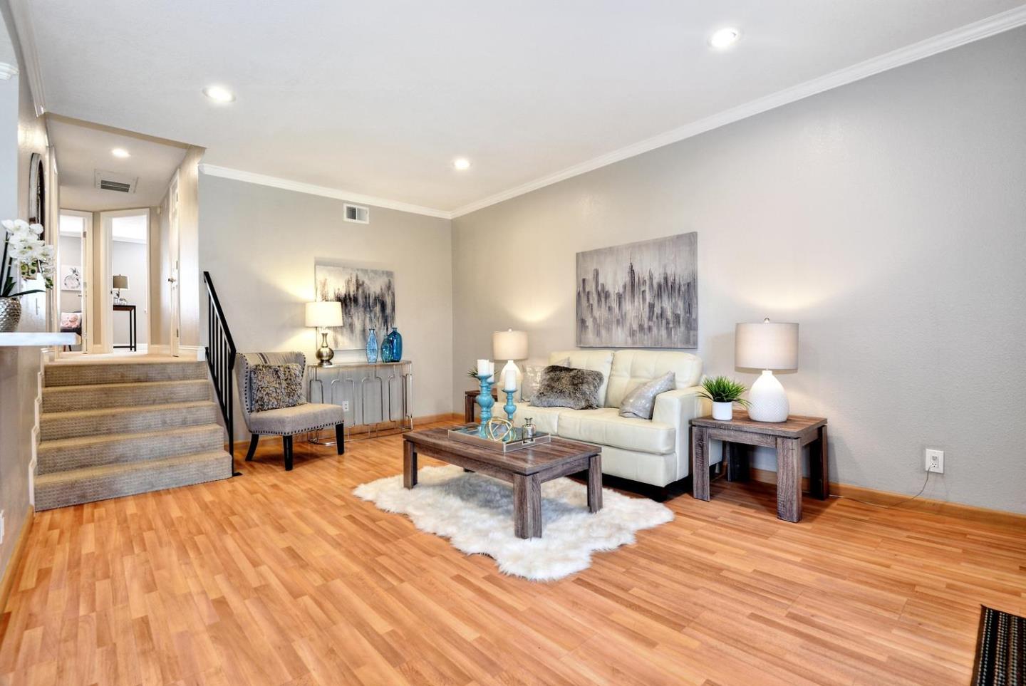 301 Kenbrook Circle San Jose, CA 95111 - Photo 3 of 19 a living room with furniture and wooden floor