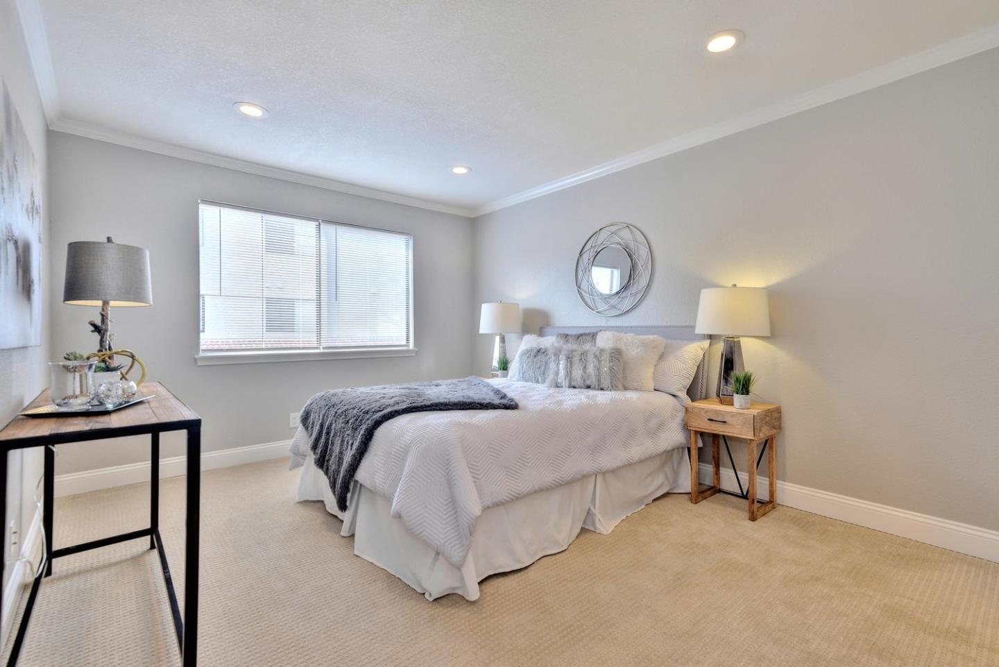 301 Kenbrook Circle San Jose, CA 95111 - Photo 9 of 19 a bedroom with a bed and window