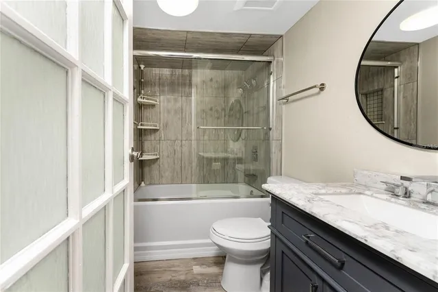 a view of a hallway with closet