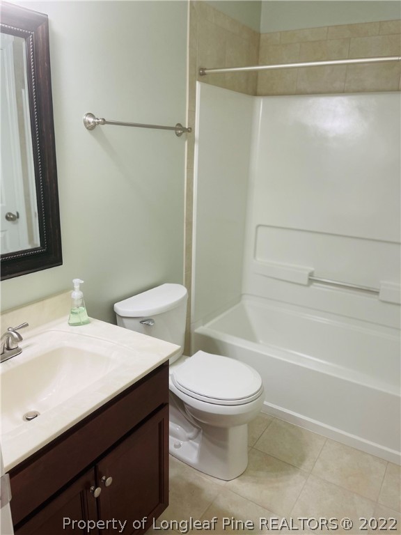 6501 Applewhite Road Fayetteville, NC 28304 - Photo 13 of 17 a bathroom with a sink toilet and shower