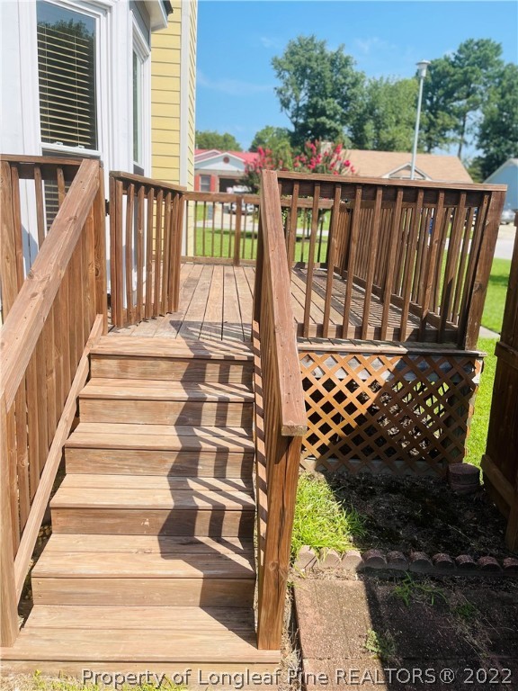 6501 Applewhite Road Fayetteville, NC 28304 - Photo 17 of 17 a view of stairs and a patio