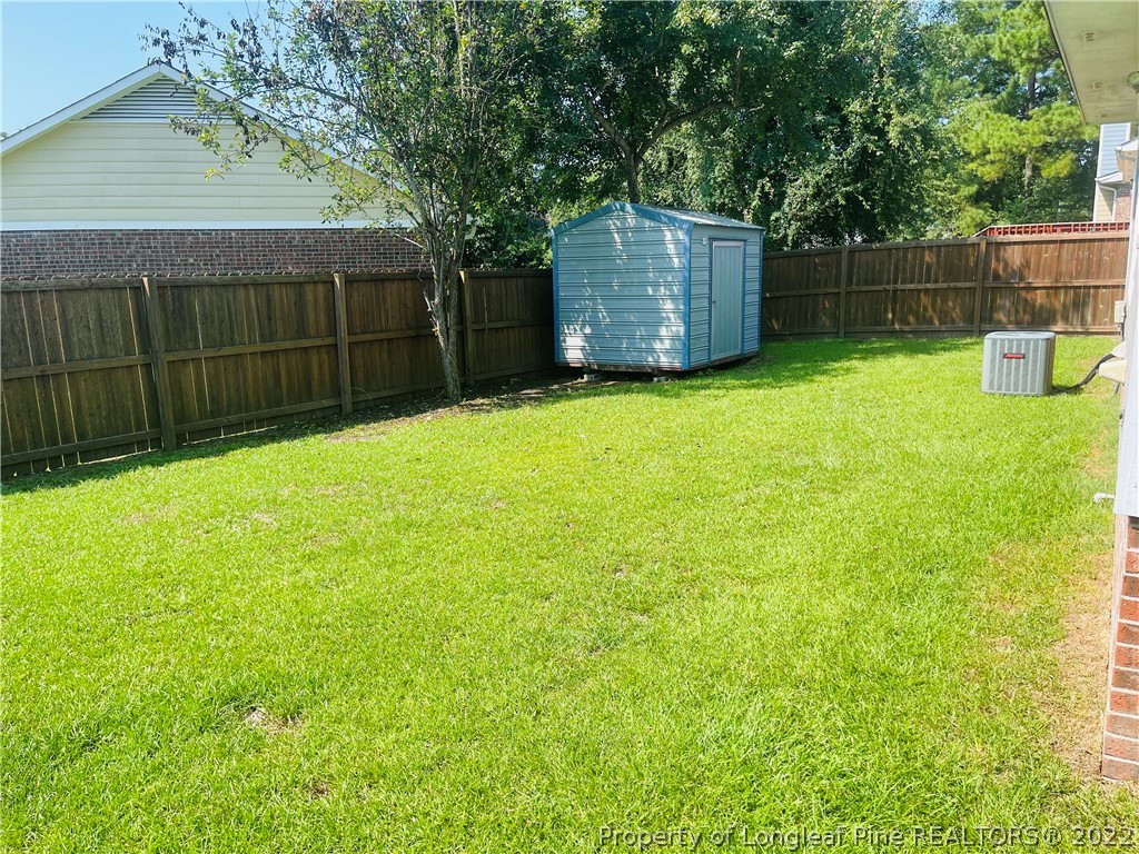6501 Applewhite Road Fayetteville, NC 28304 - Photo 6 of 17 a backyard of a house