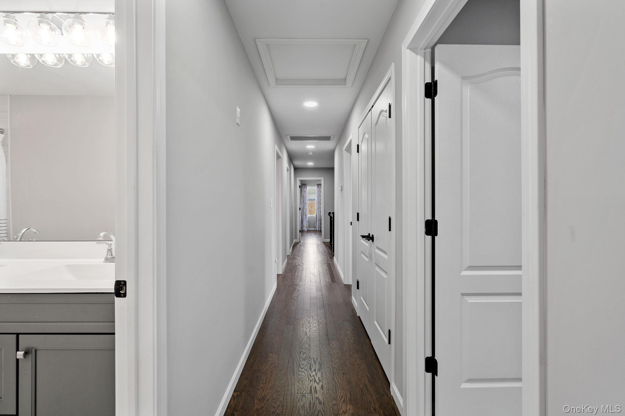 10 Harrier Ridge Drive Wallkill, NY 12589 - Photo 28 of 46 Hall featuring attic access, recessed lighting, and dark wood-type flooring