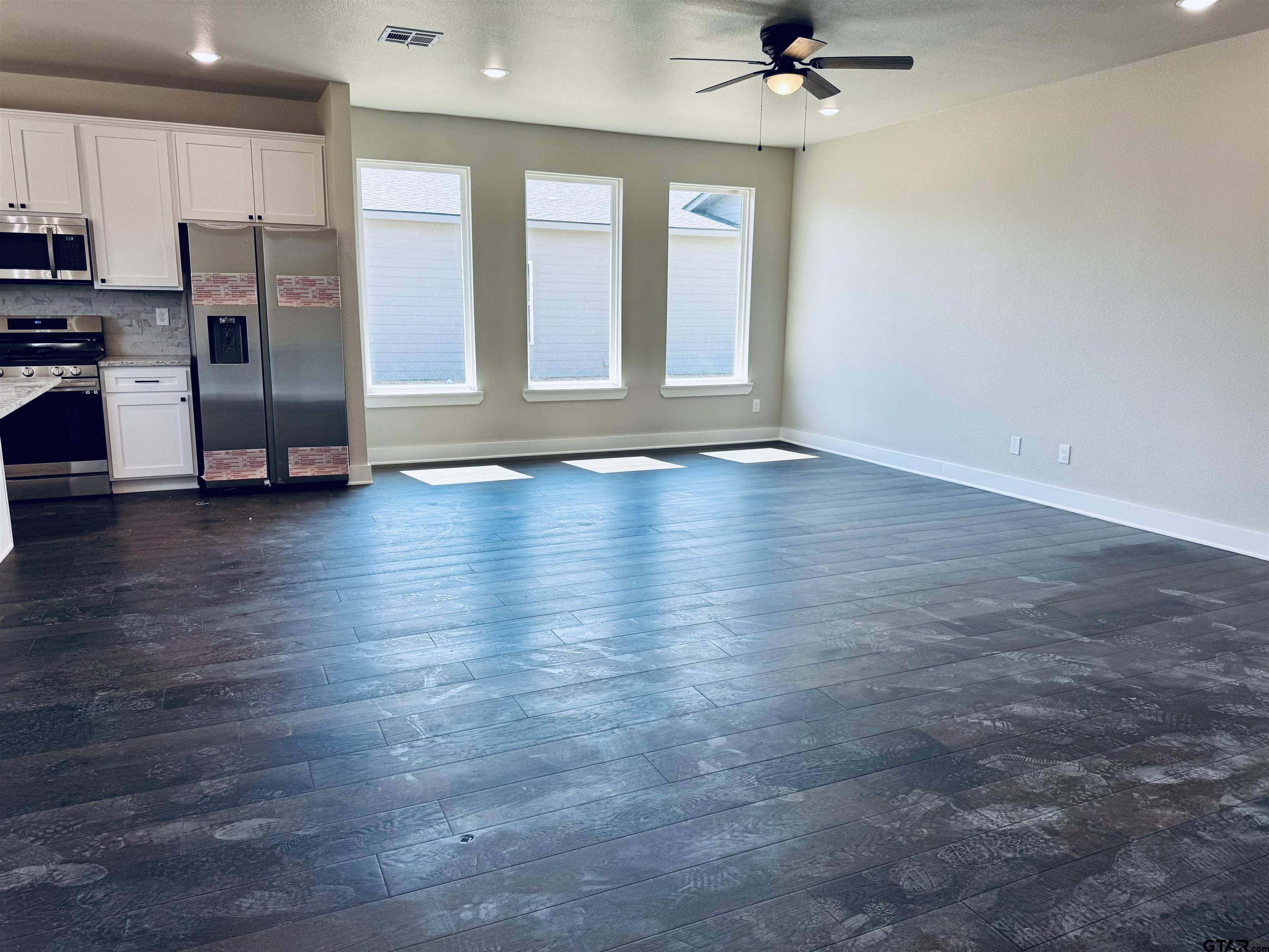 15525 Greenhouse Way Lindale, TX 75771 - Photo 5 of 7 a view of an empty room with a window