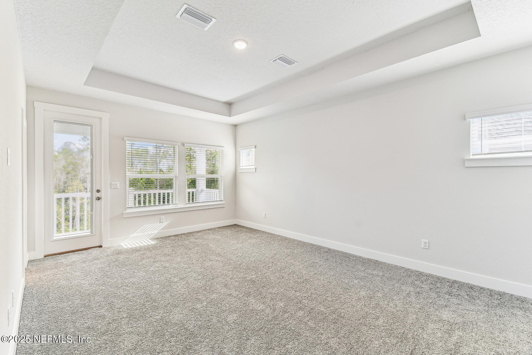 10085 Element Road Jacksonville, FL 32256 - Photo 16 of 24 a view of an empty room with a window