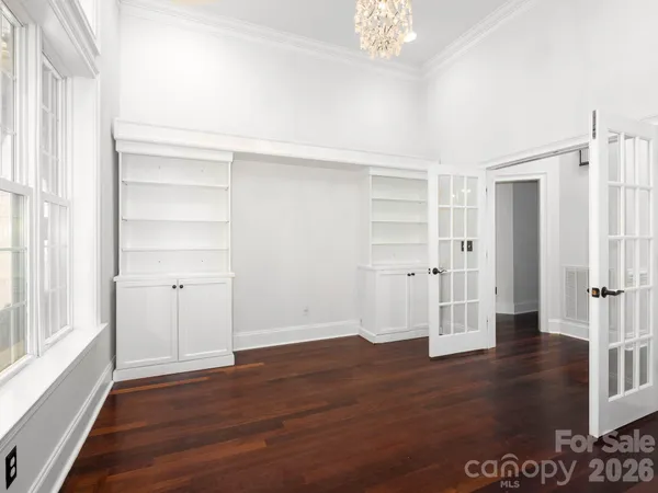 a kitchen with stainless steel appliances granite countertop a refrigerator and a stove