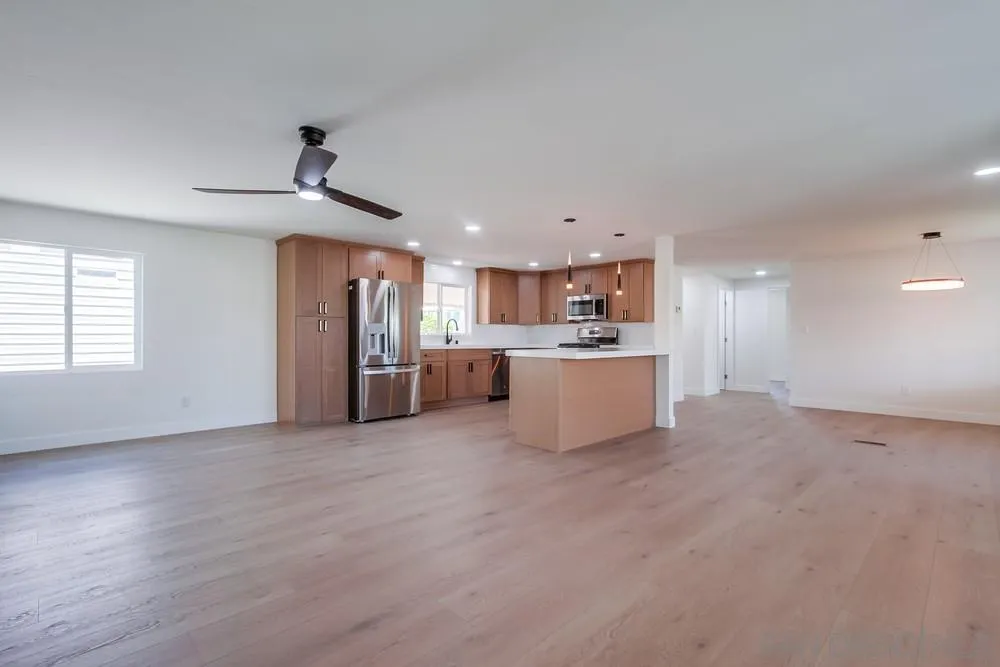 650 South Rancho Santa Fe Road, Unit 328 San Marcos, CA 92078 - Photo 16 of 22 a view of a kitchen with a sink and a refrigerator