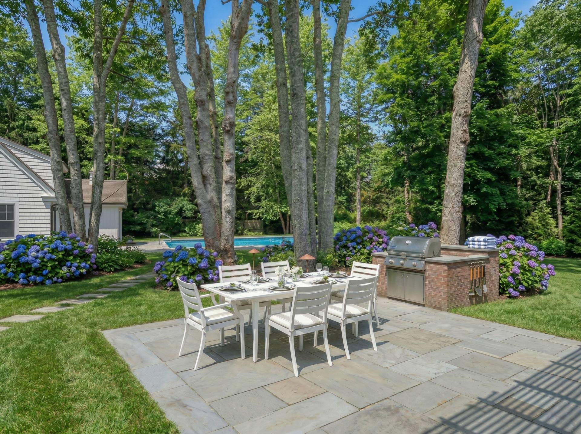 81 Georgica Road East Hampton, NY 11937 - Photo 5 of 15 a view of a sitting area with furniture and garden