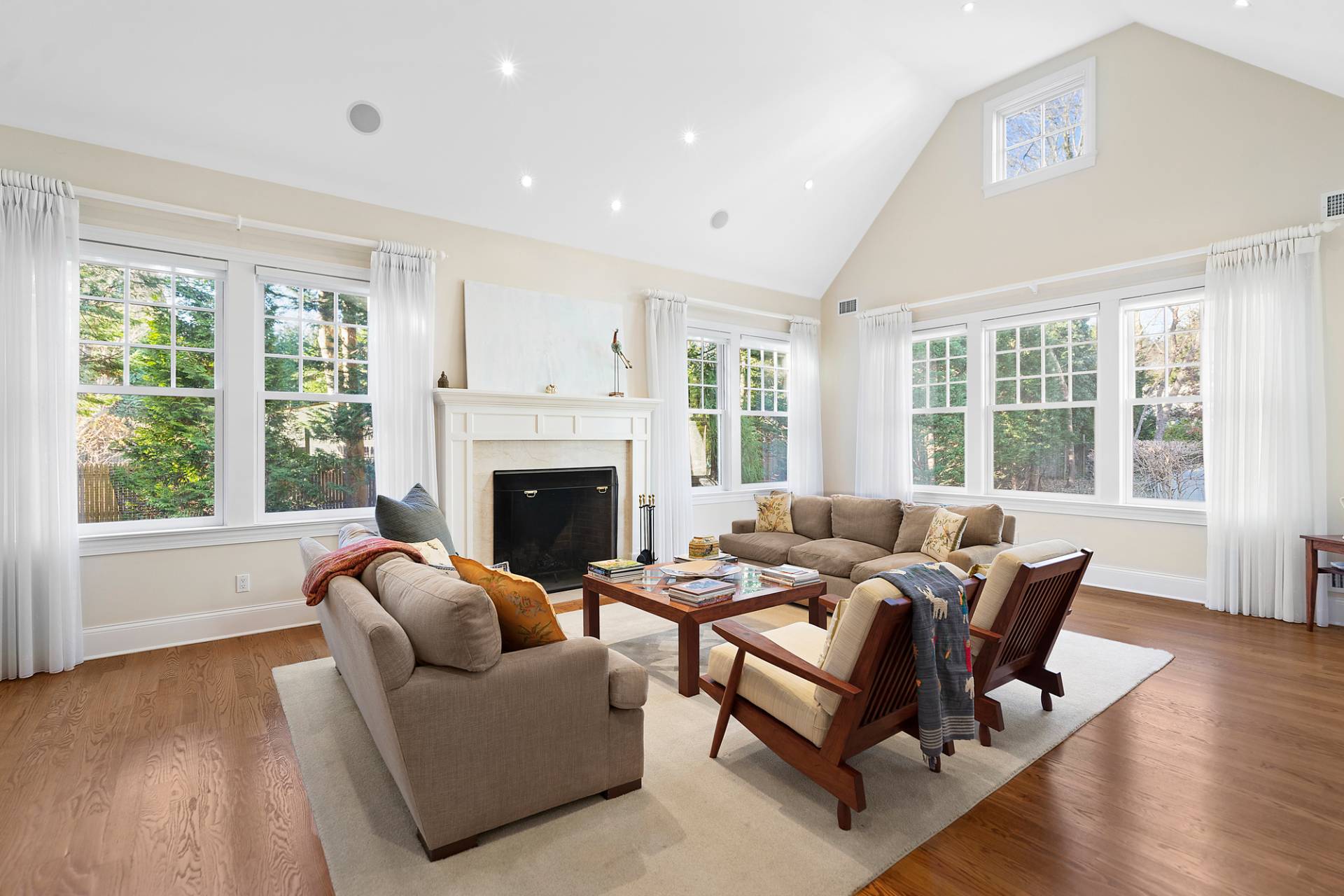 81 Georgica Road East Hampton, NY 11937 - Photo 6 of 15 a living room with furniture and a fireplace