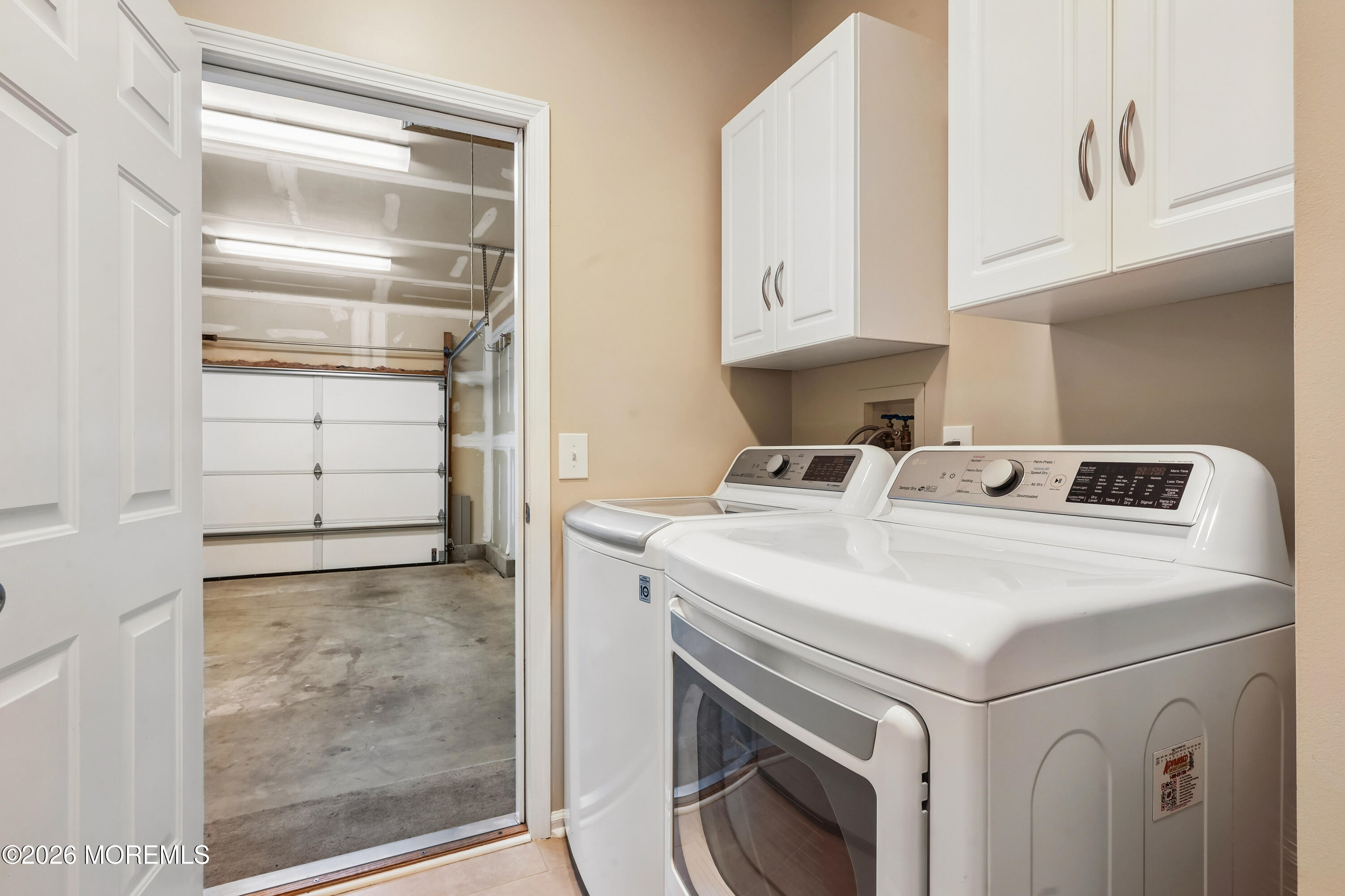 66 Sandpiper Road Barnegat, NJ 08005 - Photo 12 of 25 a utility room with dryer and washer