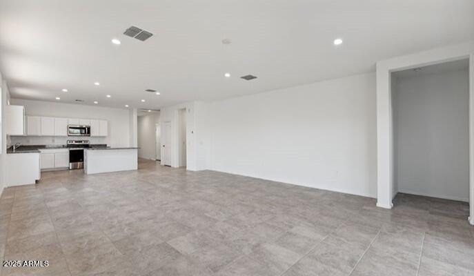 8535 West Clemente Way Florence, AZ 85132 - Photo 6 of 36 04_DiningRoom-GreatRoom