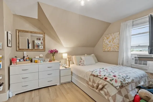 a bedroom with a bed and furniture